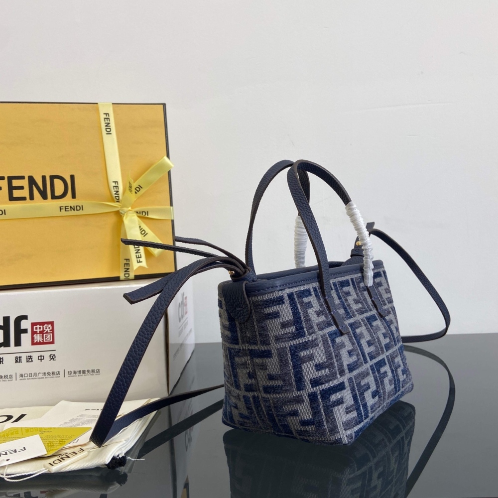 The Fendi Roll mini tote bag (FF denim monogram version) is a super popular "mini bucket" commuter bag from the brand in recent years.