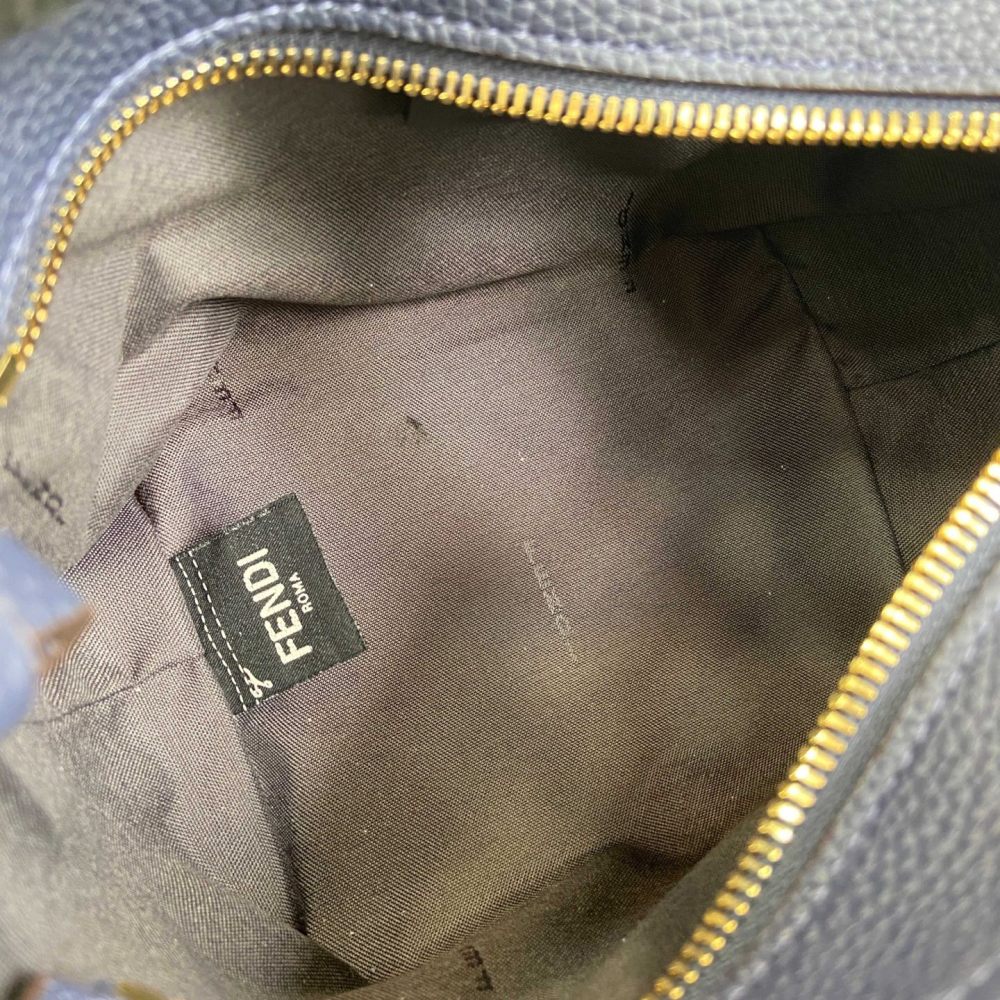 The Fendi Roll mini tote bag (FF denim monogram version) is a super popular "mini bucket" commuter bag from the brand in recent years.