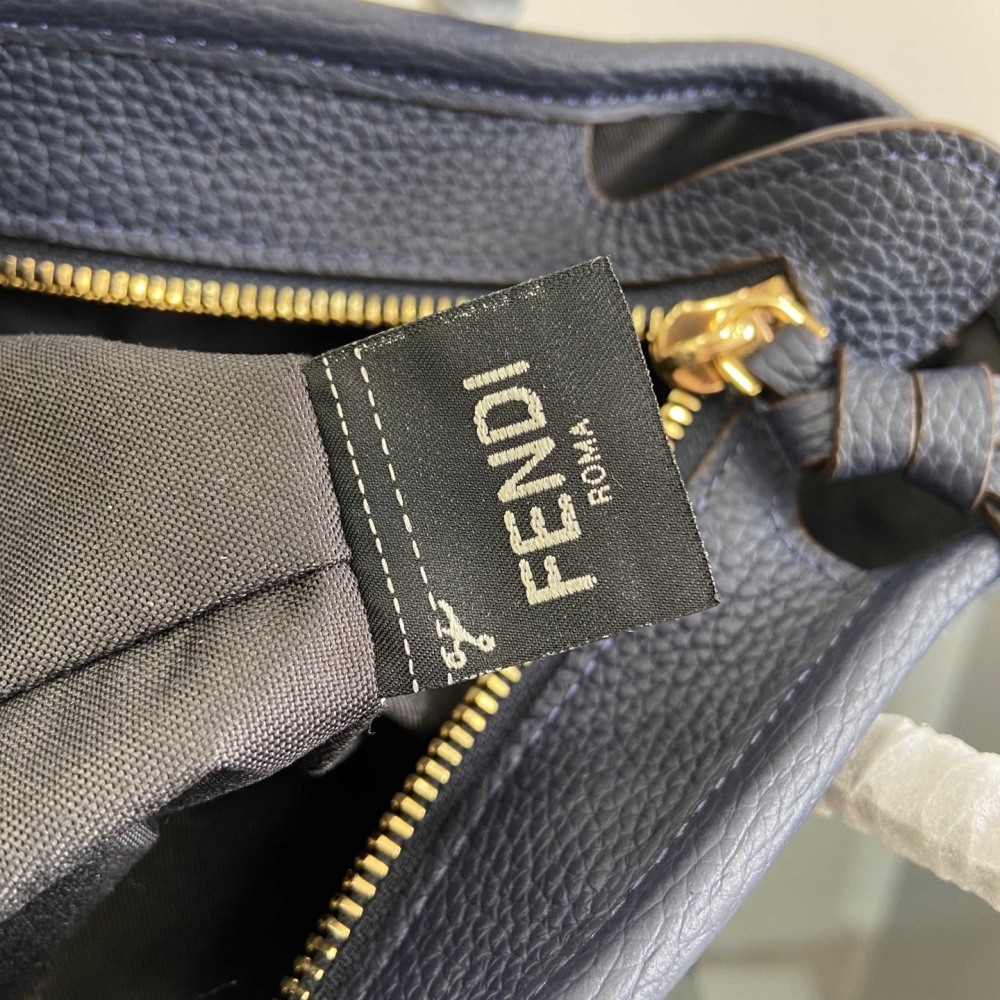 The Fendi Roll mini tote bag (FF denim monogram version) is a super popular "mini bucket" commuter bag from the brand in recent years.