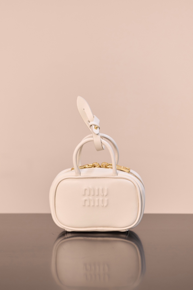 The Miu Miu Arcadie series mini leather handbag (also known as the "Extra-Small / Mini Bowling Bag") has been one of the brand's most popular styles in recent years.