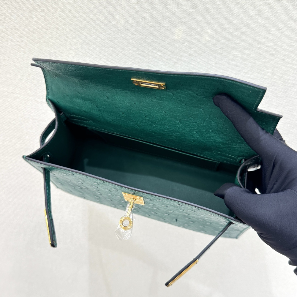 The Hermès Mini Kelly I (also known as the Kelly Pochette) Ostrich Leather Handbag is one of the brand's classic exotic leather models.