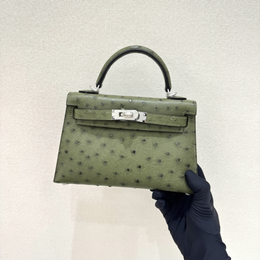 The Hermès Mini Kelly I (also known as the Kelly Pochette) Ostrich Leather Handbag is one of the brand's classic exotic leather models.