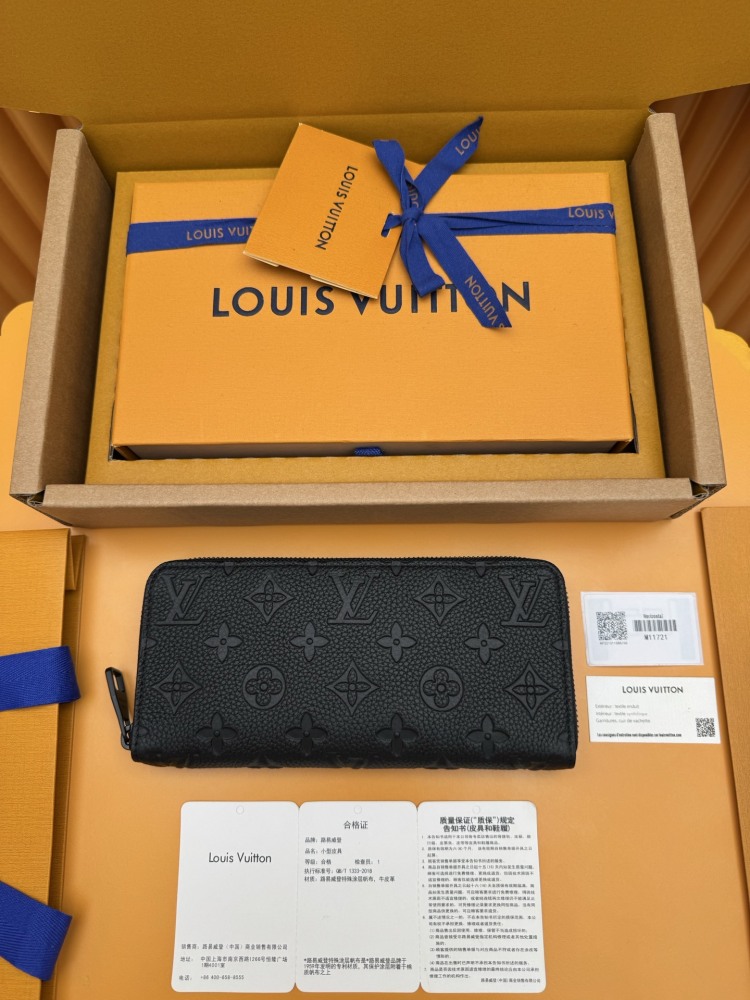 The Louis Vuitton Zippy Wallet, crafted from classic Monogram-embossed Taurillon leather, features an all-black colorway (commonly referred to as "Noir" or "Black Monogram").