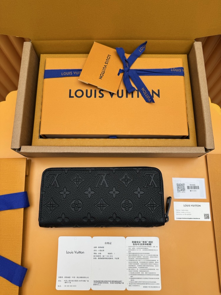 The Louis Vuitton Zippy Wallet, crafted from classic Monogram-embossed Taurillon leather, features an all-black colorway (commonly referred to as "Noir" or "Black Monogram").