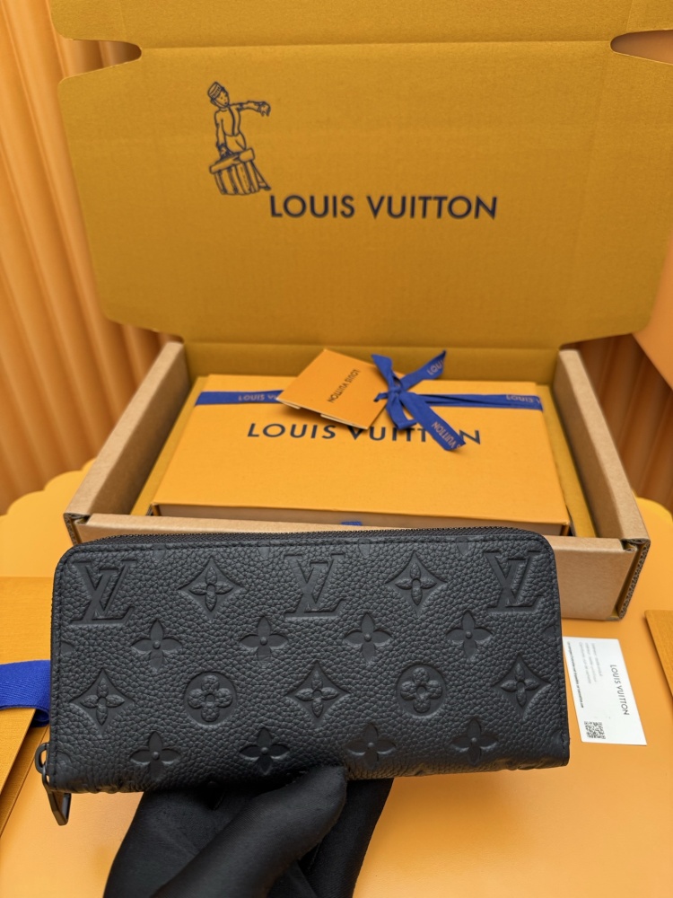 The Louis Vuitton Zippy Wallet, crafted from classic Monogram-embossed Taurillon leather, features an all-black colorway (commonly referred to as "Noir" or "Black Monogram").