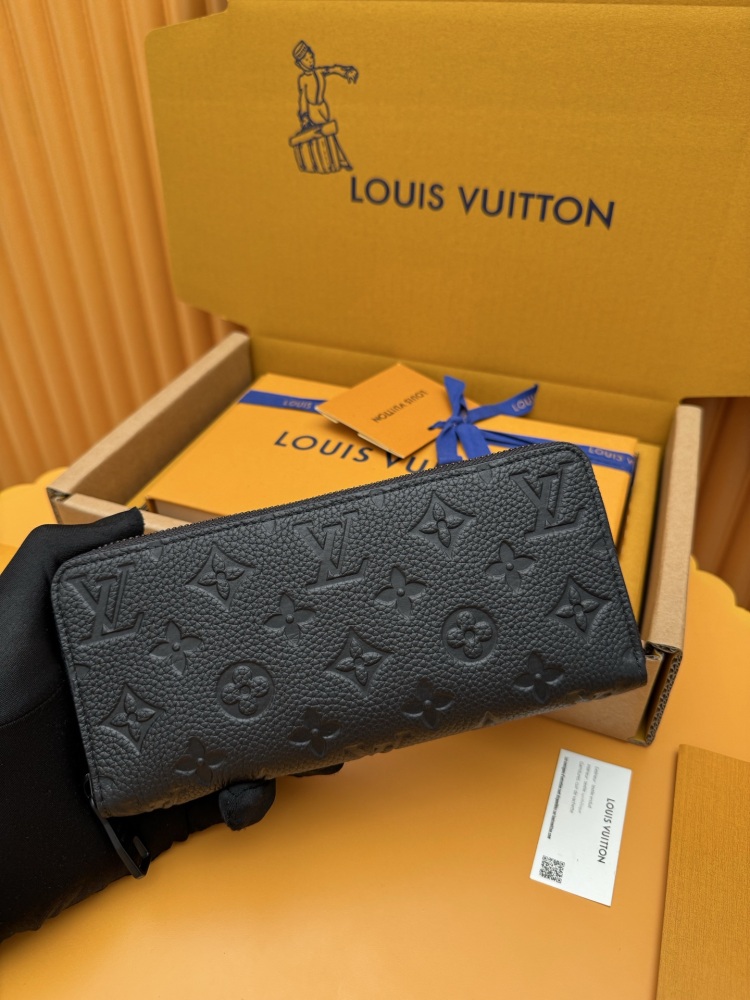 The Louis Vuitton Zippy Wallet, crafted from classic Monogram-embossed Taurillon leather, features an all-black colorway (commonly referred to as "Noir" or "Black Monogram").