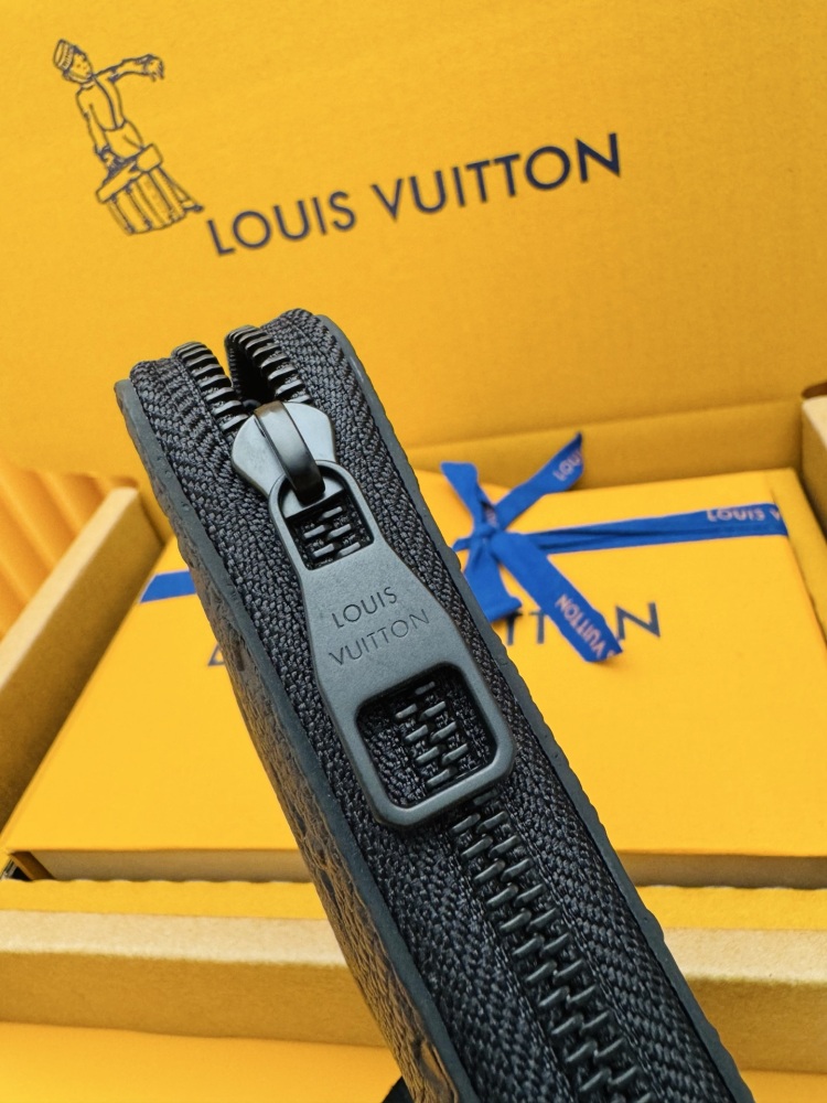 The Louis Vuitton Zippy Wallet, crafted from classic Monogram-embossed Taurillon leather, features an all-black colorway (commonly referred to as "Noir" or "Black Monogram").