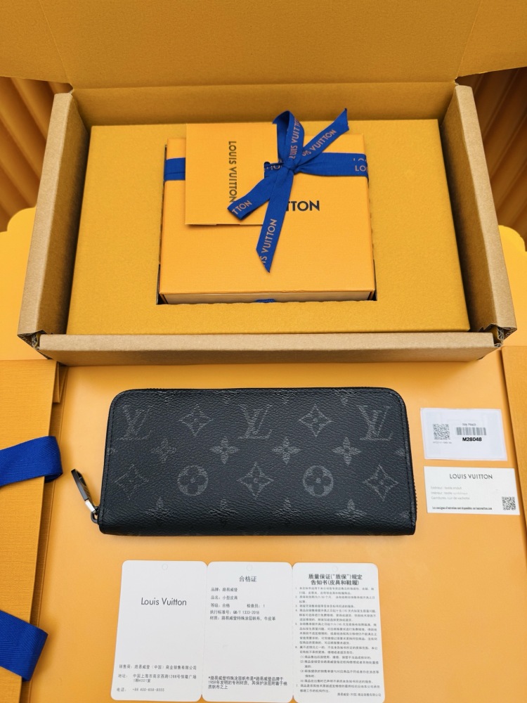 Louis Vuitton Zippy Long Zip-Around Wallet — specifically the Monogram Eclipse canvas version.