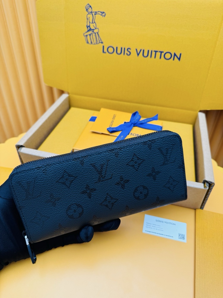 Louis Vuitton Zippy Long Zip-Around Wallet — specifically the Monogram Eclipse canvas version.