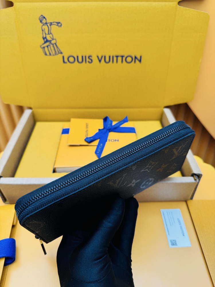 Louis Vuitton Zippy Long Zip-Around Wallet — specifically the Monogram Eclipse canvas version.