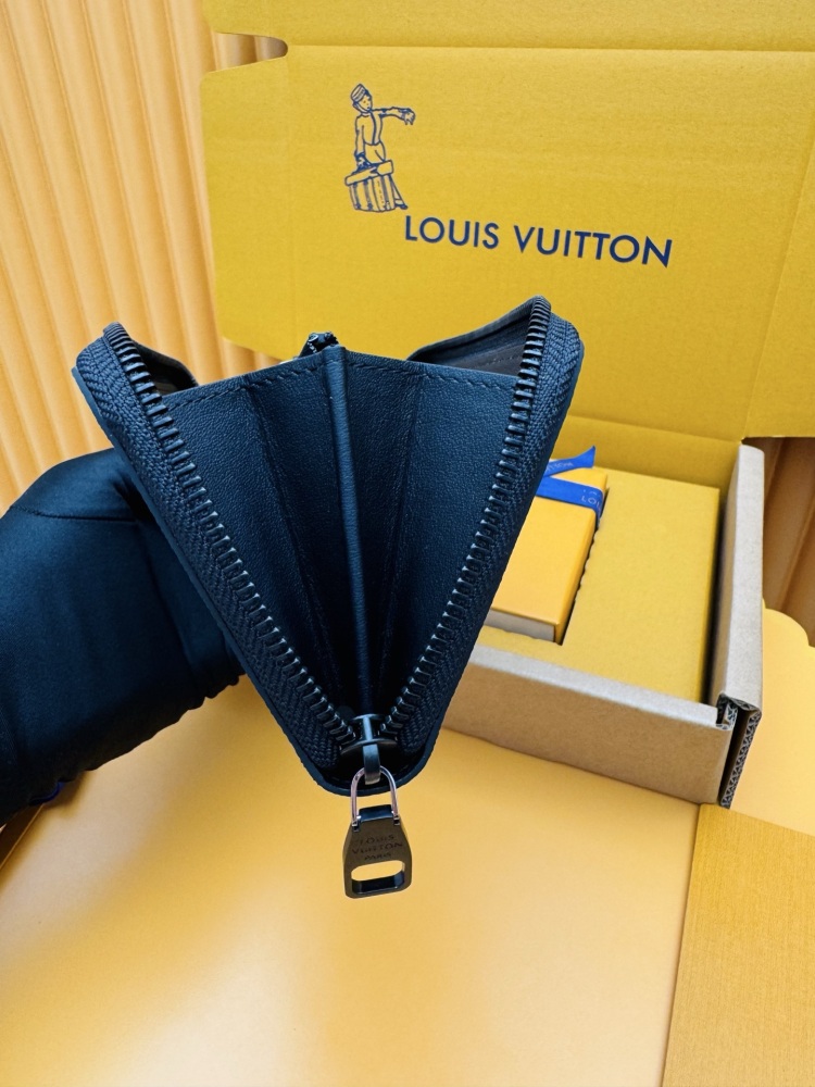 Louis Vuitton Zippy Long Zip-Around Wallet — specifically the Monogram Eclipse canvas version.