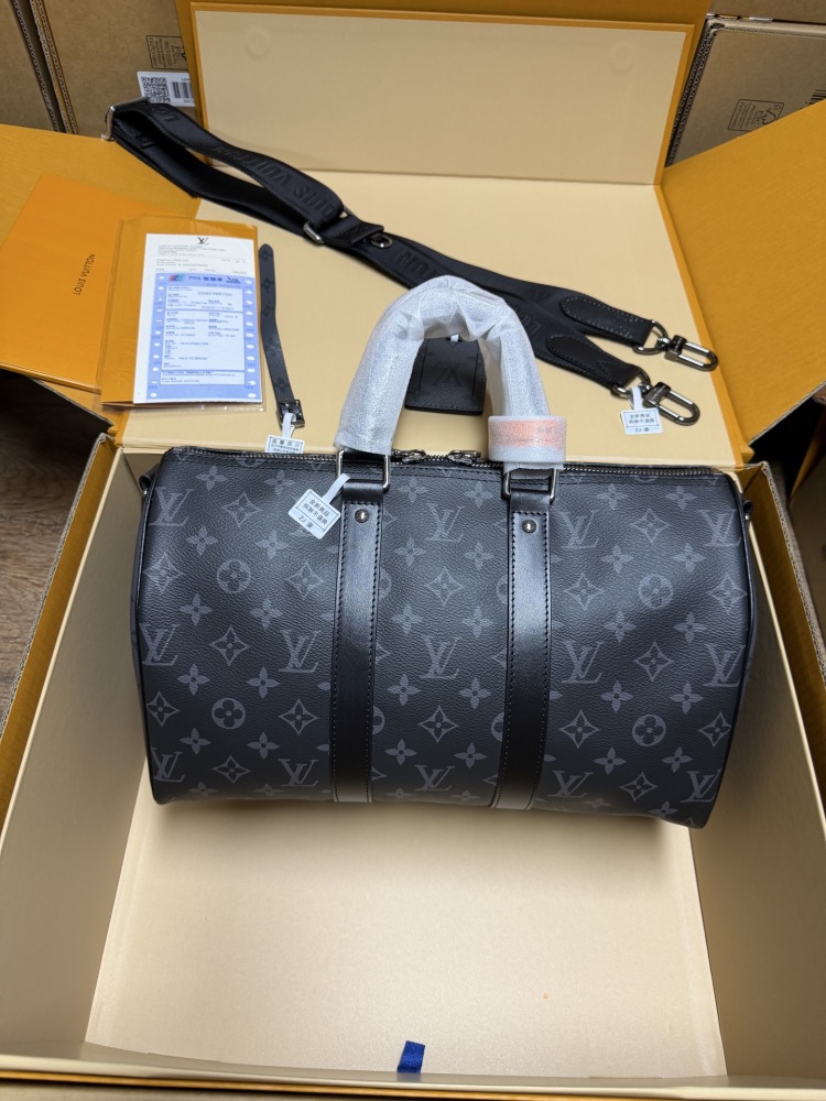 The Louis Vuitton Keepall Bandoulière 35 bag features the classic Monogram Eclipse black and grey canvas.