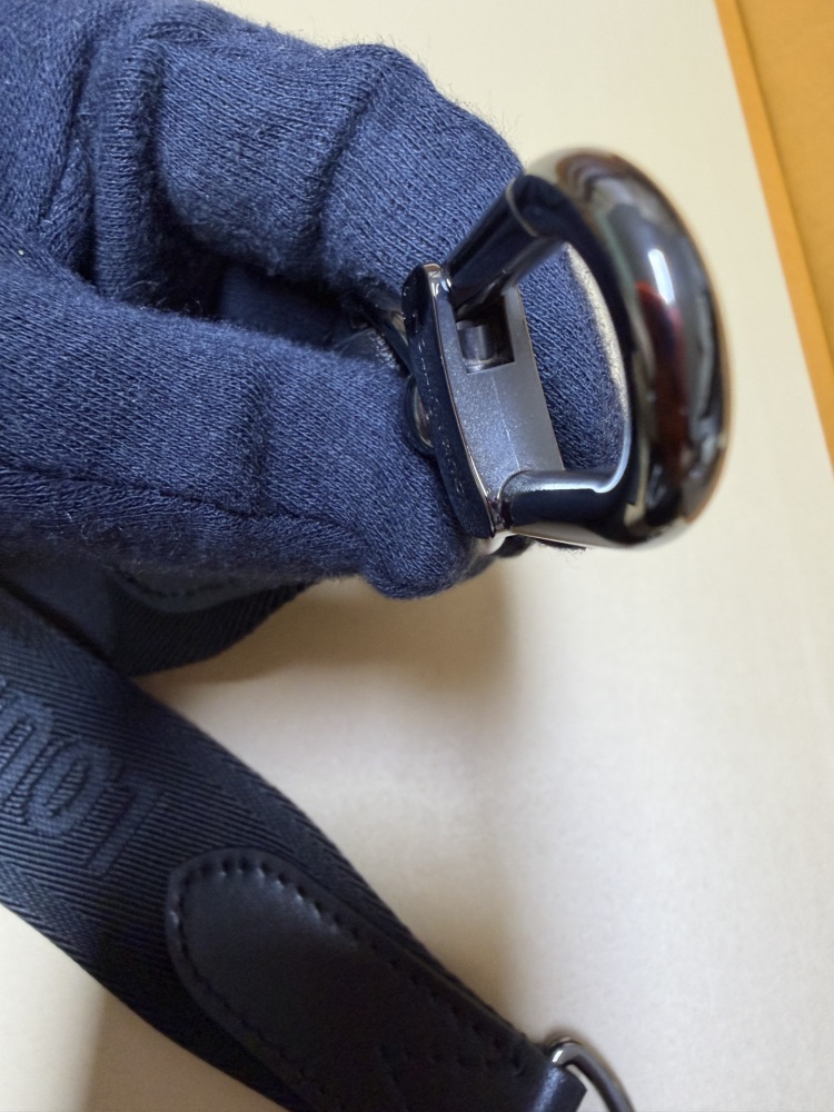 The Louis Vuitton Keepall Bandoulière 35 bag features the classic Monogram Eclipse black and grey canvas.