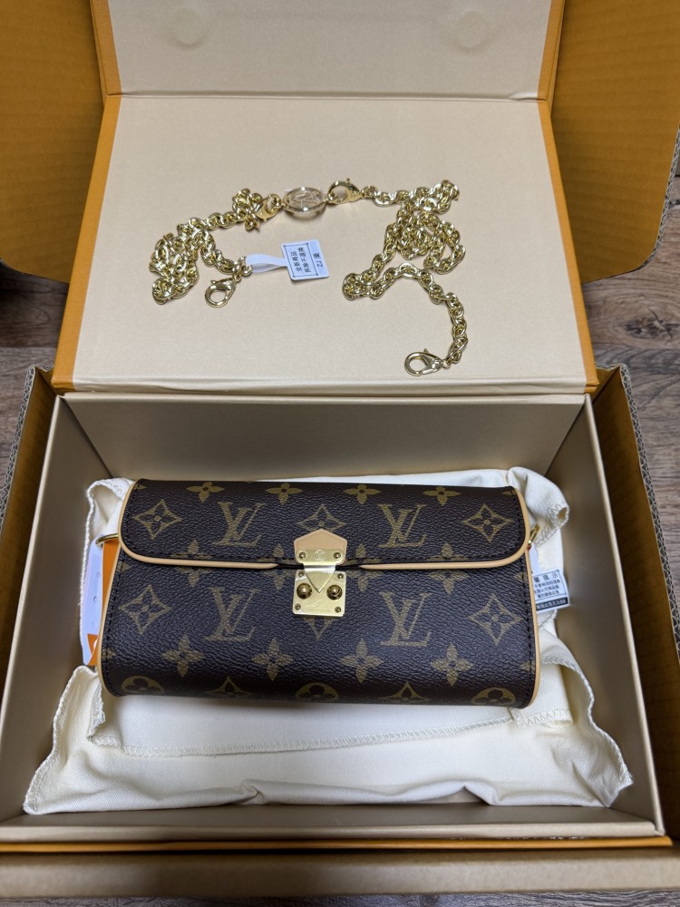 The Louis Vuitton LV East-West Mini Chain Bag (colloquially known as the "Mini Papillon") is crafted from the classic Monogram canvas.