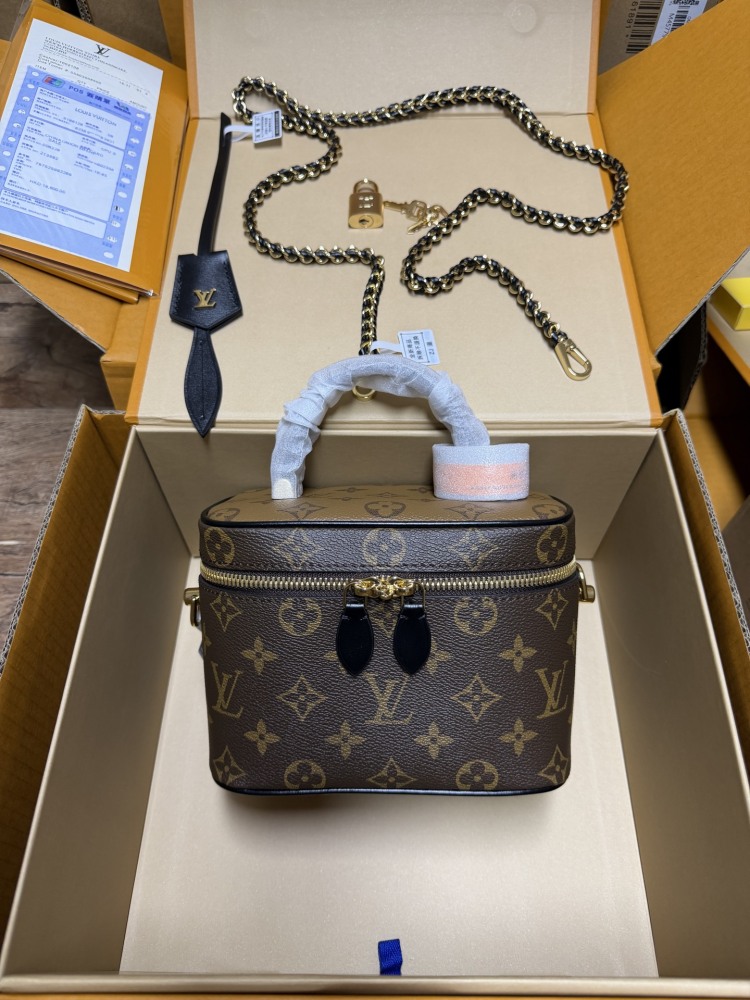 The Louis Vuitton Vanity Small Handbag (Cosmetic Case Style) features the classic Monogram canvas paired with gold-tone hardware.