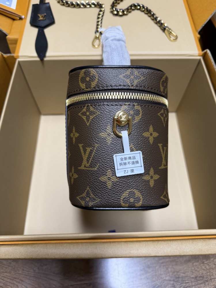 The Louis Vuitton Vanity Small Handbag (Cosmetic Case Style) features the classic Monogram canvas paired with gold-tone hardware.