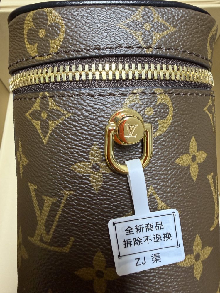 The Louis Vuitton Vanity Small Handbag (Cosmetic Case Style) features the classic Monogram canvas paired with gold-tone hardware.