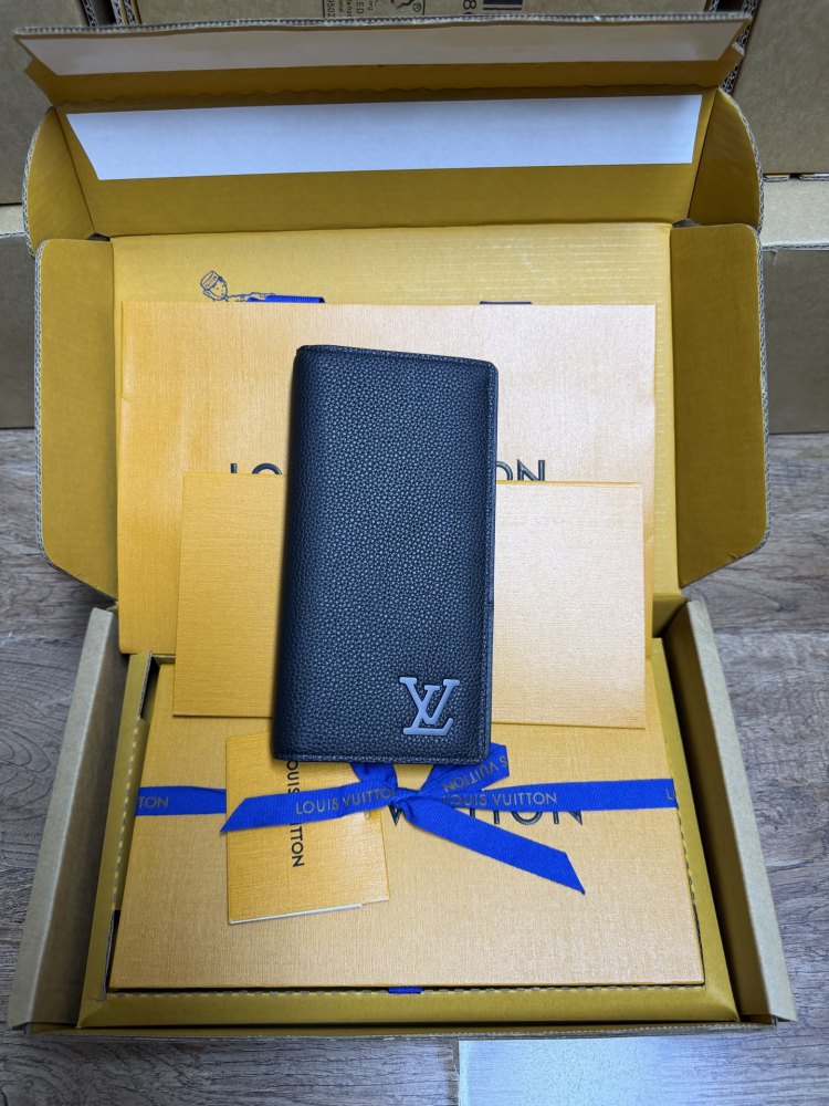 The Louis Vuitton LV Aerogram long bi-fold wallet is crafted from grained cowhide leather, a material specifically developed by the brand for men.