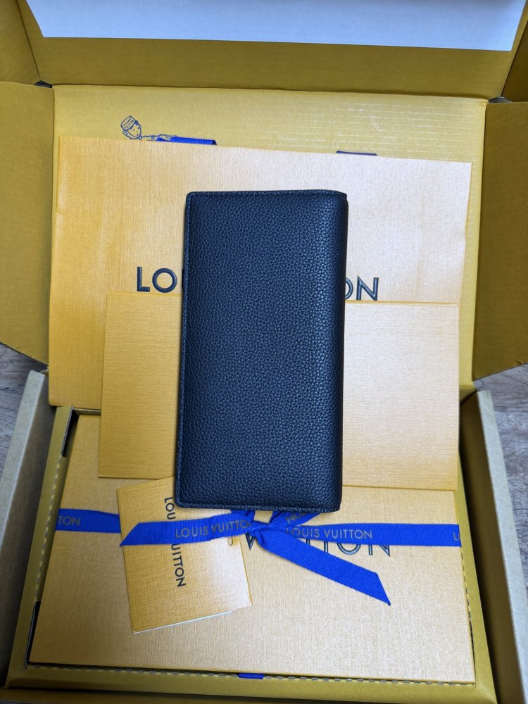 The Louis Vuitton LV Aerogram long bi-fold wallet is crafted from grained cowhide leather, a material specifically developed by the brand for men.