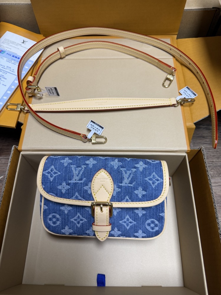 The Louis Vuitton Nano Diane mini baguette bag features the brand's iconic Monogram denim canvas.