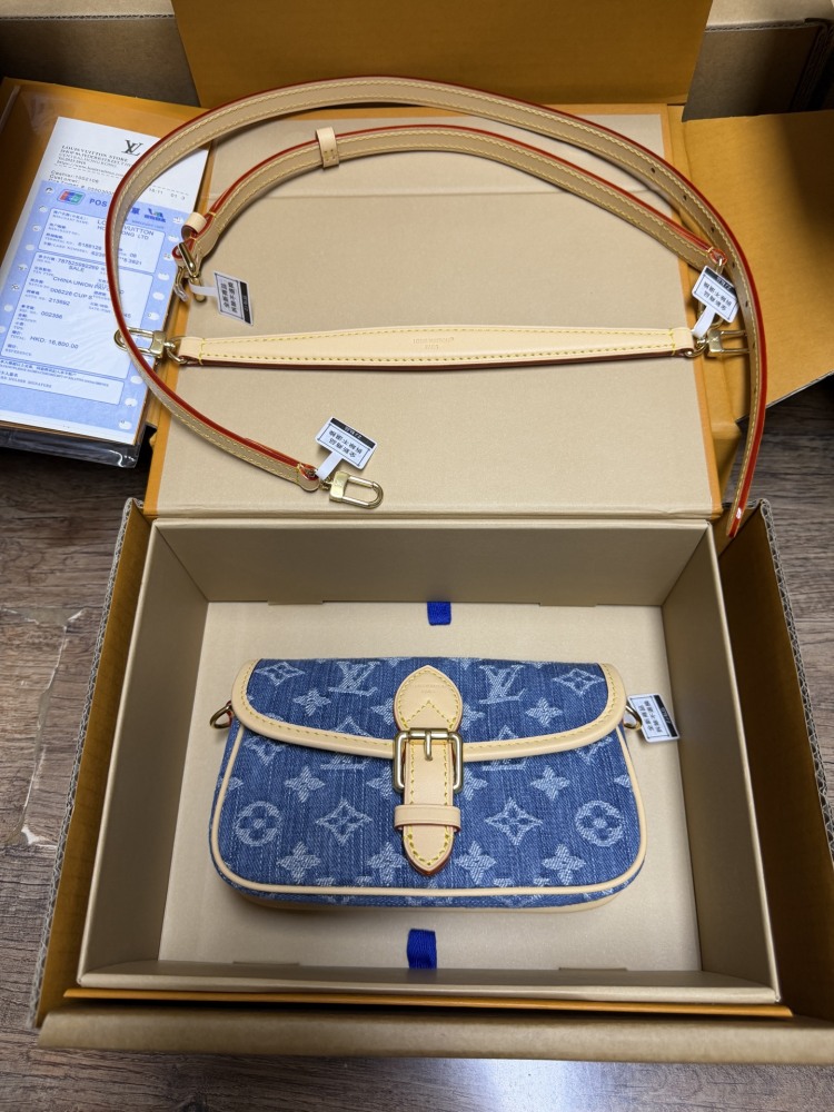 The Louis Vuitton Nano Diane mini baguette bag features the brand's iconic Monogram denim canvas.