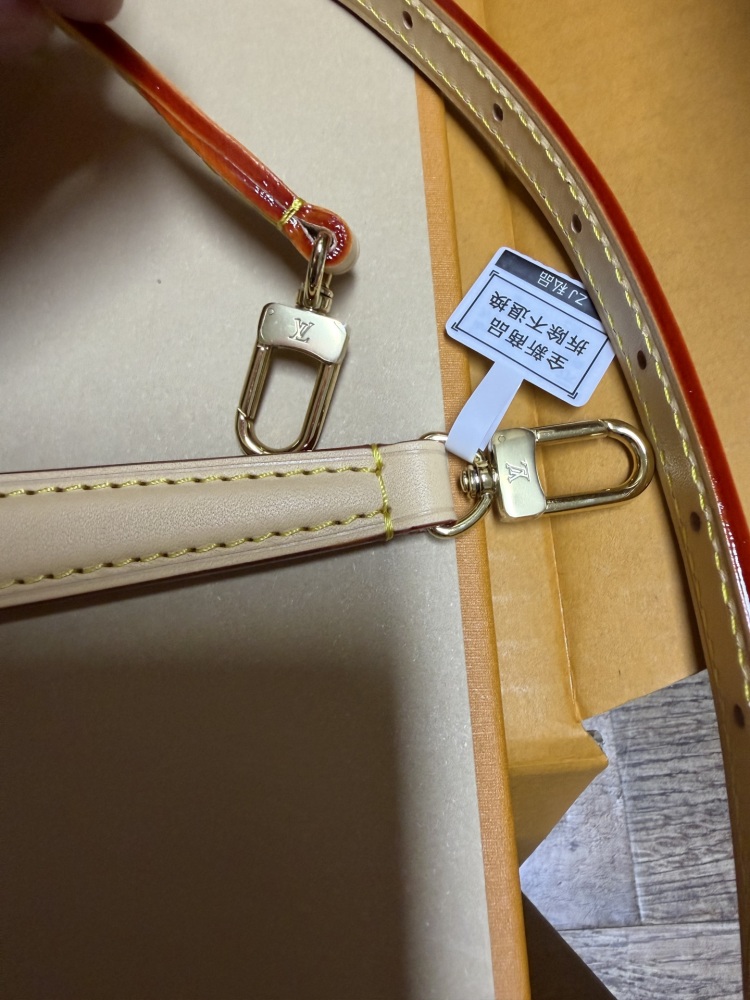 The Louis Vuitton Nano Diane mini baguette bag features the brand's iconic Monogram denim canvas.