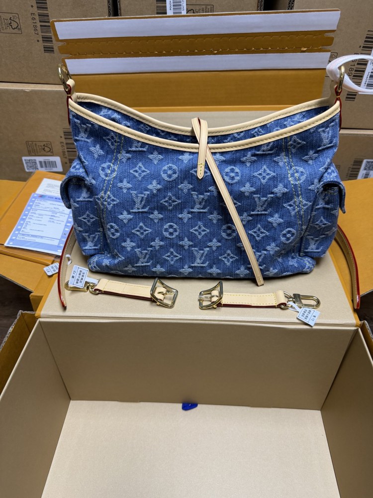 The Louis Vuitton Carryall Denim handbag is a highly sought-after, retro-style shoulder bag that has enjoyed immense popularity in recent years.
