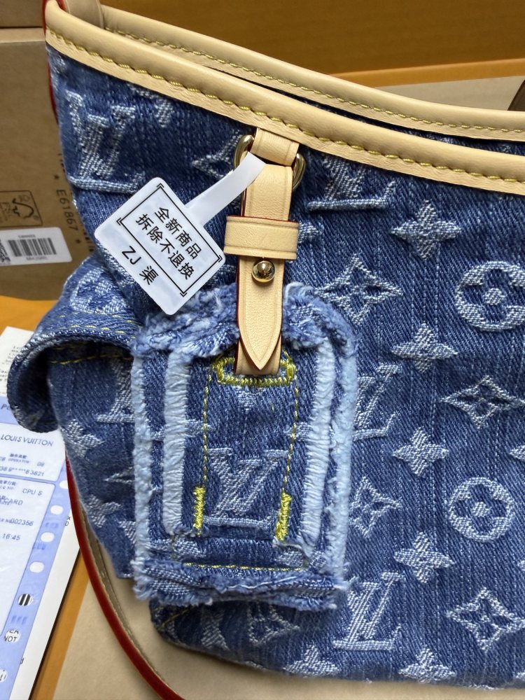 The Louis Vuitton Carryall Denim handbag is a highly sought-after, retro-style shoulder bag that has enjoyed immense popularity in recent years.