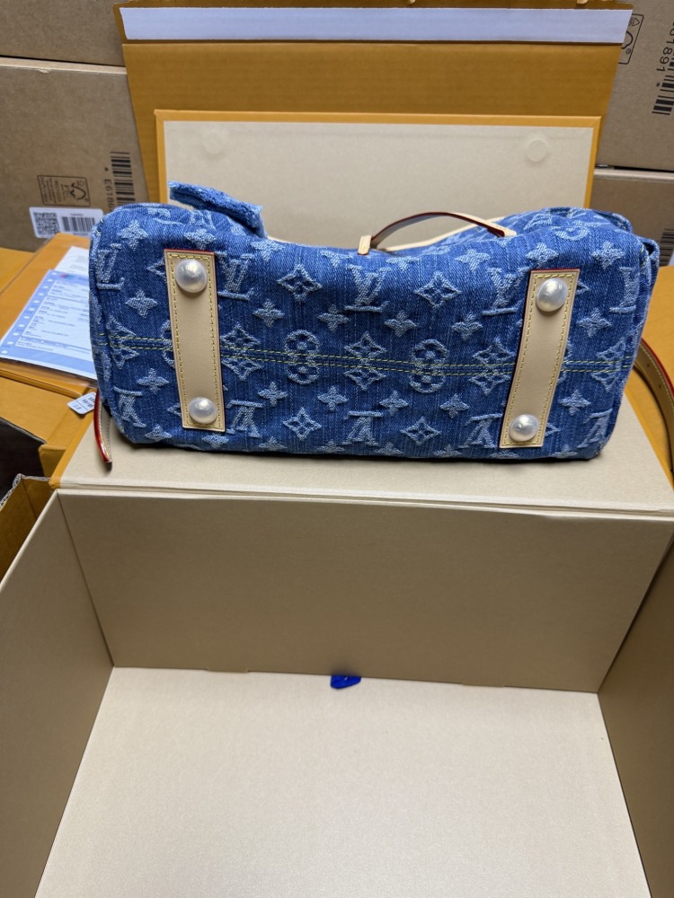 The Louis Vuitton Carryall Denim handbag is a highly sought-after, retro-style shoulder bag that has enjoyed immense popularity in recent years.