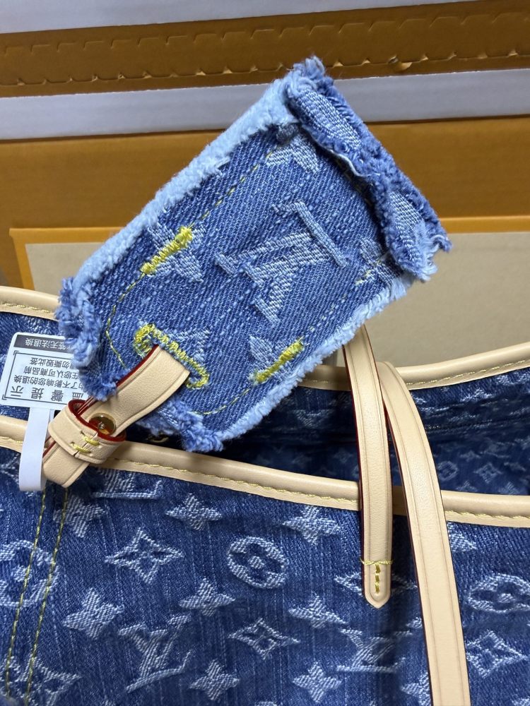 The Louis Vuitton Carryall Denim handbag is a highly sought-after, retro-style shoulder bag that has enjoyed immense popularity in recent years.