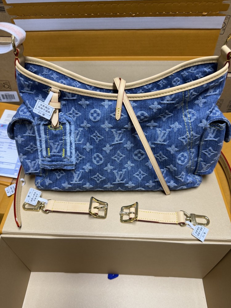 The Louis Vuitton Carryall Denim handbag is a highly sought-after, retro-style shoulder bag that has enjoyed immense popularity in recent years.