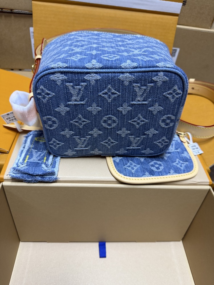 The Louis Vuitton Nano Bucket bag features the Monogram Denim canvas—a highly popular material in recent years.