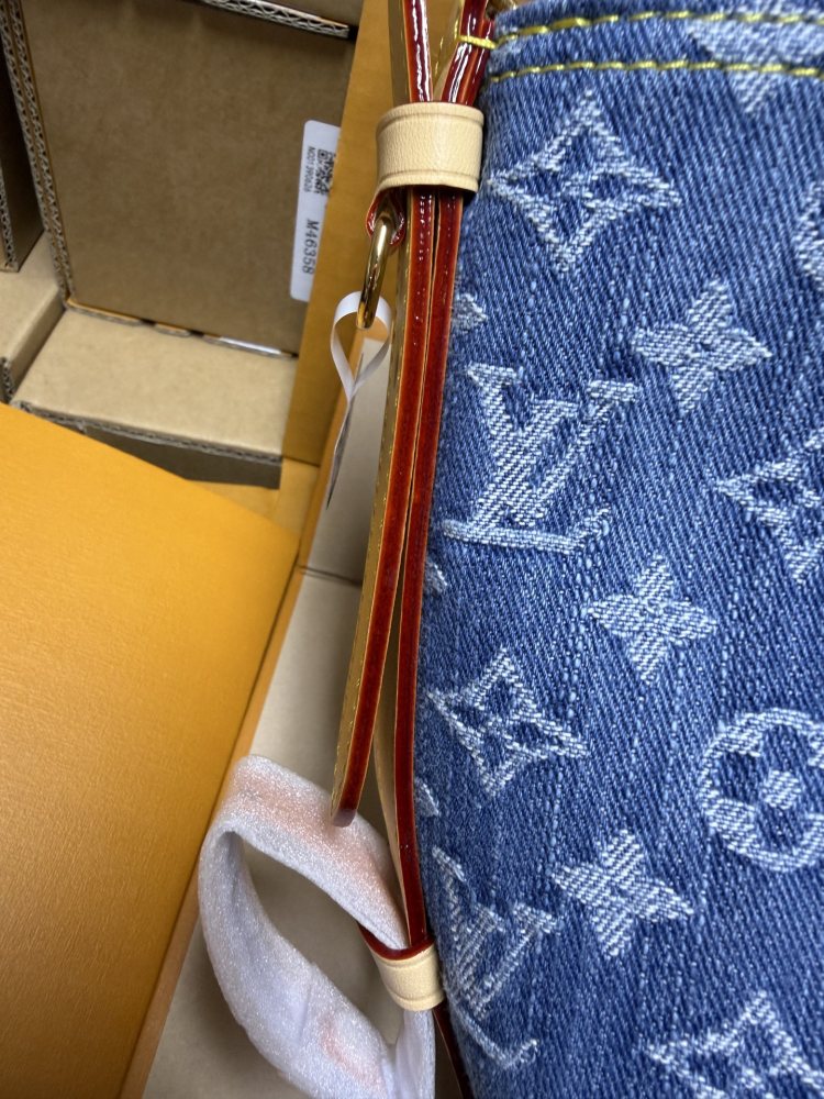 The Louis Vuitton Nano Bucket bag features the Monogram Denim canvas—a highly popular material in recent years.