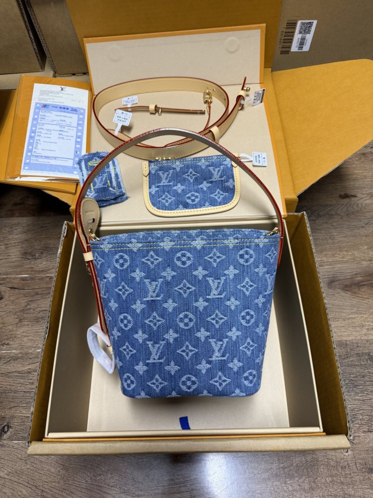 The Louis Vuitton Nano Bucket bag features the Monogram Denim canvas—a highly popular material in recent years.
