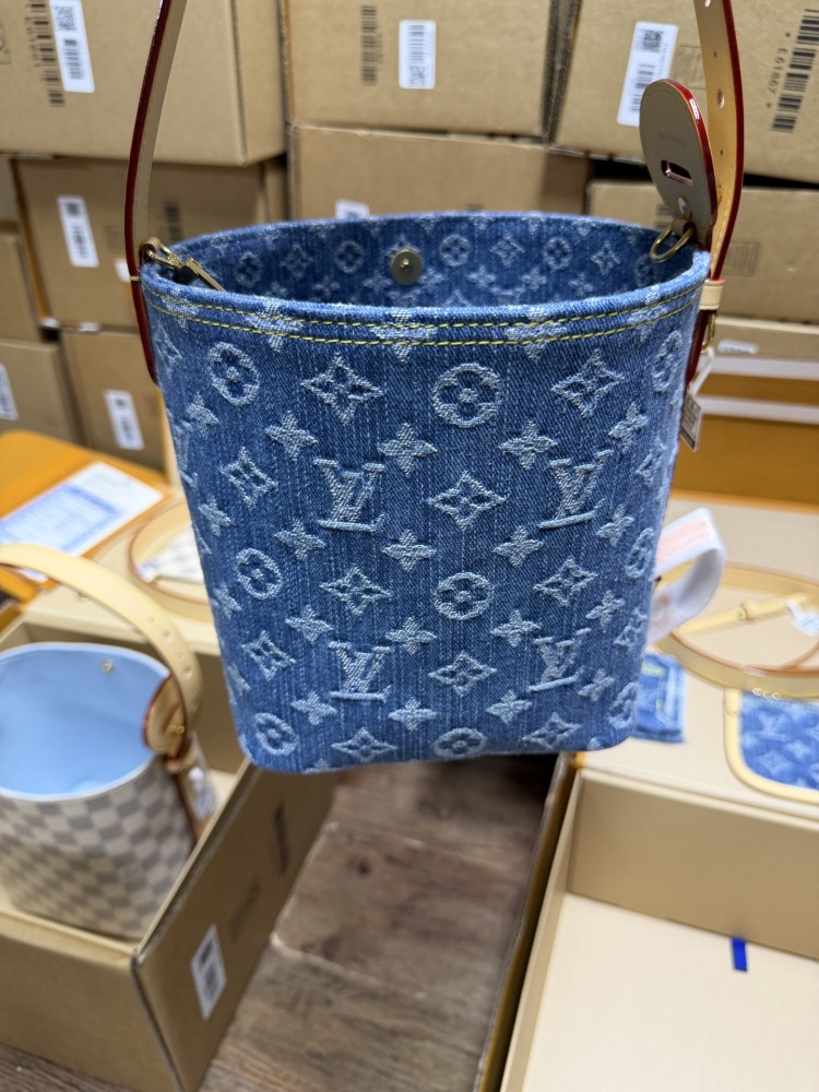The Louis Vuitton Nano Bucket bag features the Monogram Denim canvas—a highly popular material in recent years.