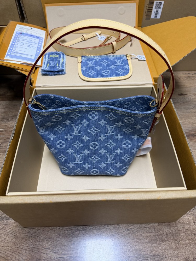 The Louis Vuitton Nano Bucket bag features the Monogram Denim canvas—a highly popular material in recent years.