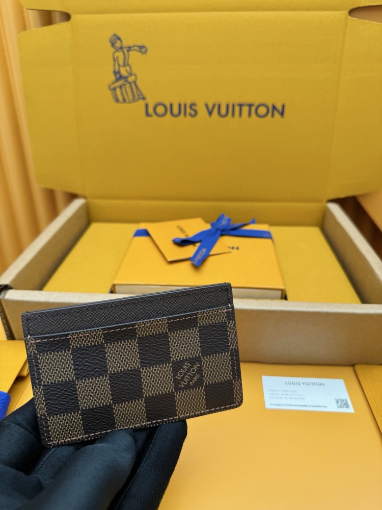 The Louis Vuitton Damier Ebene Card Holder (Model N61722) is one of the brand's classic entry-level leather goods.