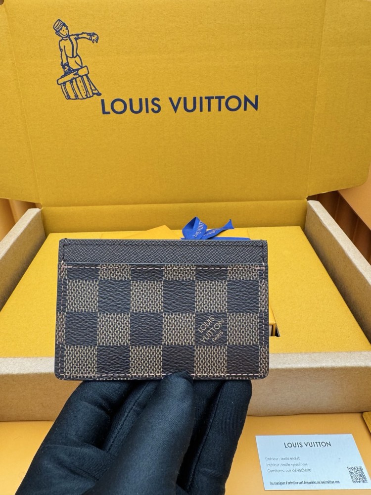The Louis Vuitton Damier Ebene Card Holder (Model N61722) is one of the brand's classic entry-level leather goods.