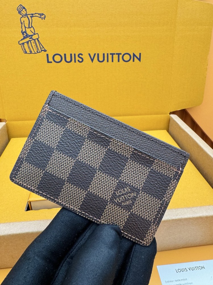 The Louis Vuitton Damier Ebene Card Holder (Model N61722) is one of the brand's classic entry-level leather goods.