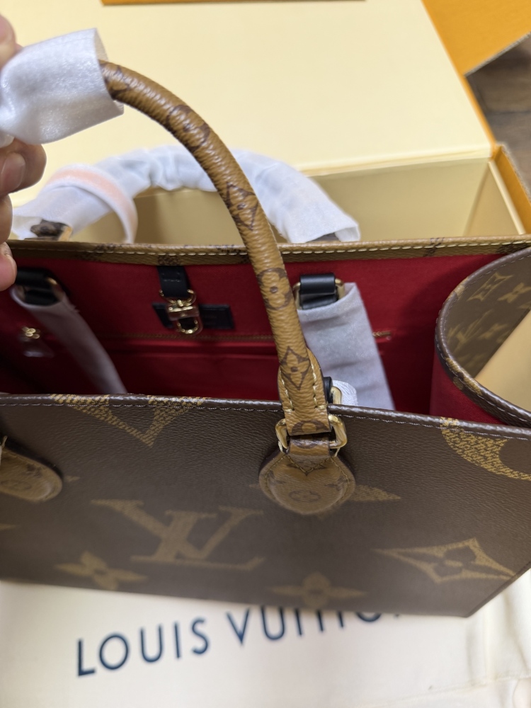 The Louis Vuitton OnTheGo PM small tote bag, crafted from the classic Monogram Giant canvas.