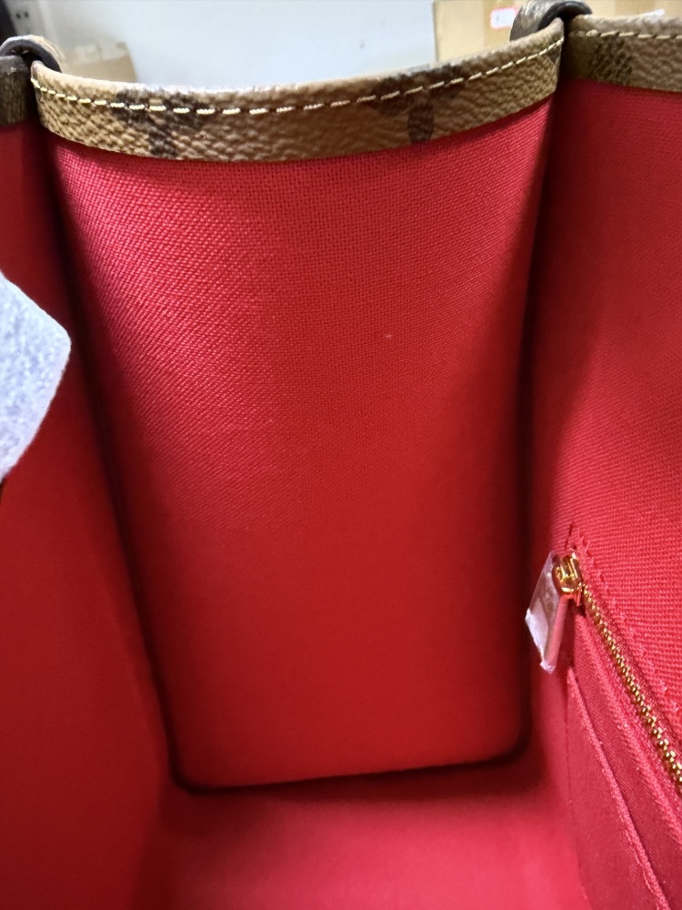 The Louis Vuitton OnTheGo PM small tote bag, crafted from the classic Monogram Giant canvas.