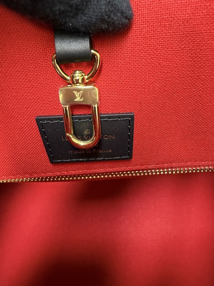 The Louis Vuitton OnTheGo PM small tote bag, crafted from the classic Monogram Giant canvas.