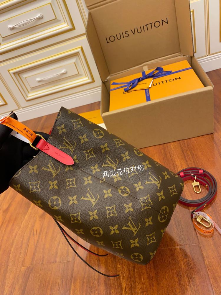 The Louis Vuitton NéoNoé MM bucket bag features the classic Monogram canvas, paired with a vibrant red lining and drawstring.
