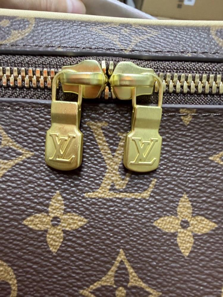 Louis Vuitton Nice BB Small Vanity Case / Handbag, crafted in the brand's classic Monogram canvas.