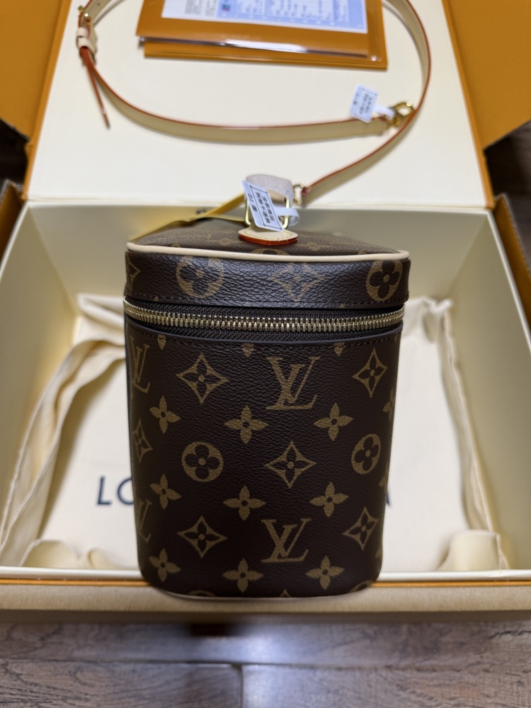 Louis Vuitton Nice BB Small Vanity Case / Handbag, crafted in the brand's classic Monogram canvas.