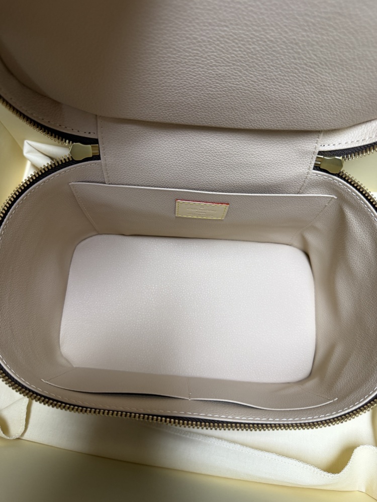 Louis Vuitton Nice BB Small Vanity Case / Handbag, crafted in the brand's classic Monogram canvas.