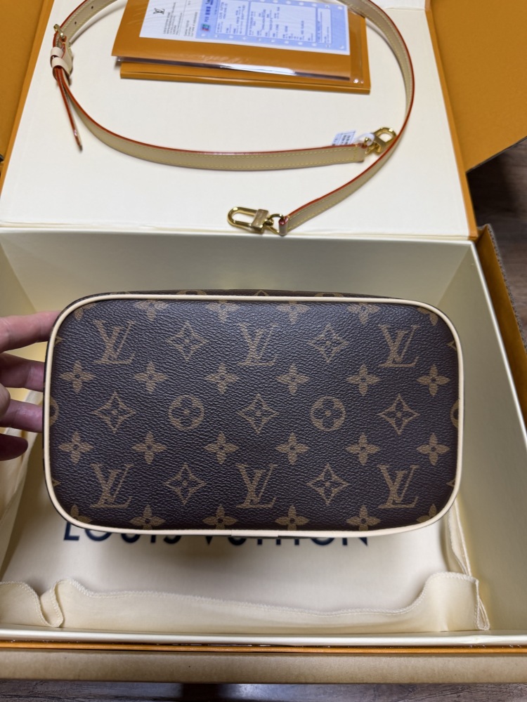 Louis Vuitton Nice BB Small Vanity Case / Handbag, crafted in the brand's classic Monogram canvas.