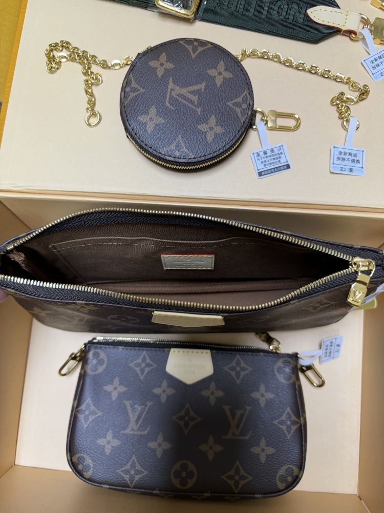 The Louis Vuitton Multi Pochette Accessoires features the brand's classic Monogram canvas, paired with a popular wide green shoulder strap.