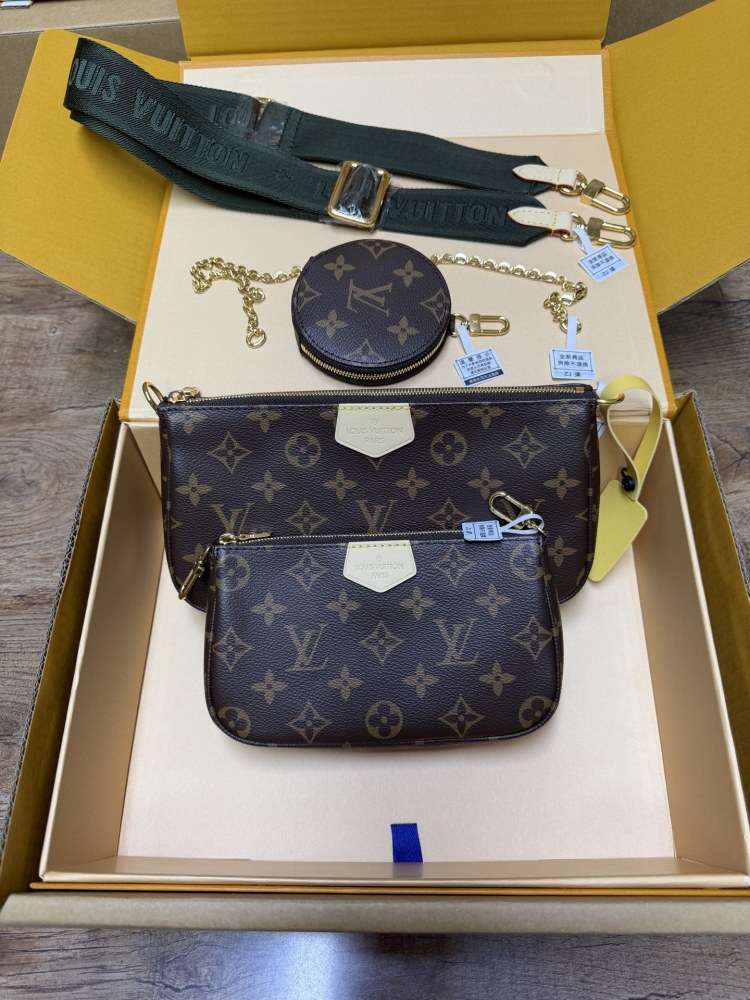 The Louis Vuitton Multi Pochette Accessoires features the brand's classic Monogram canvas, paired with a popular wide green shoulder strap.