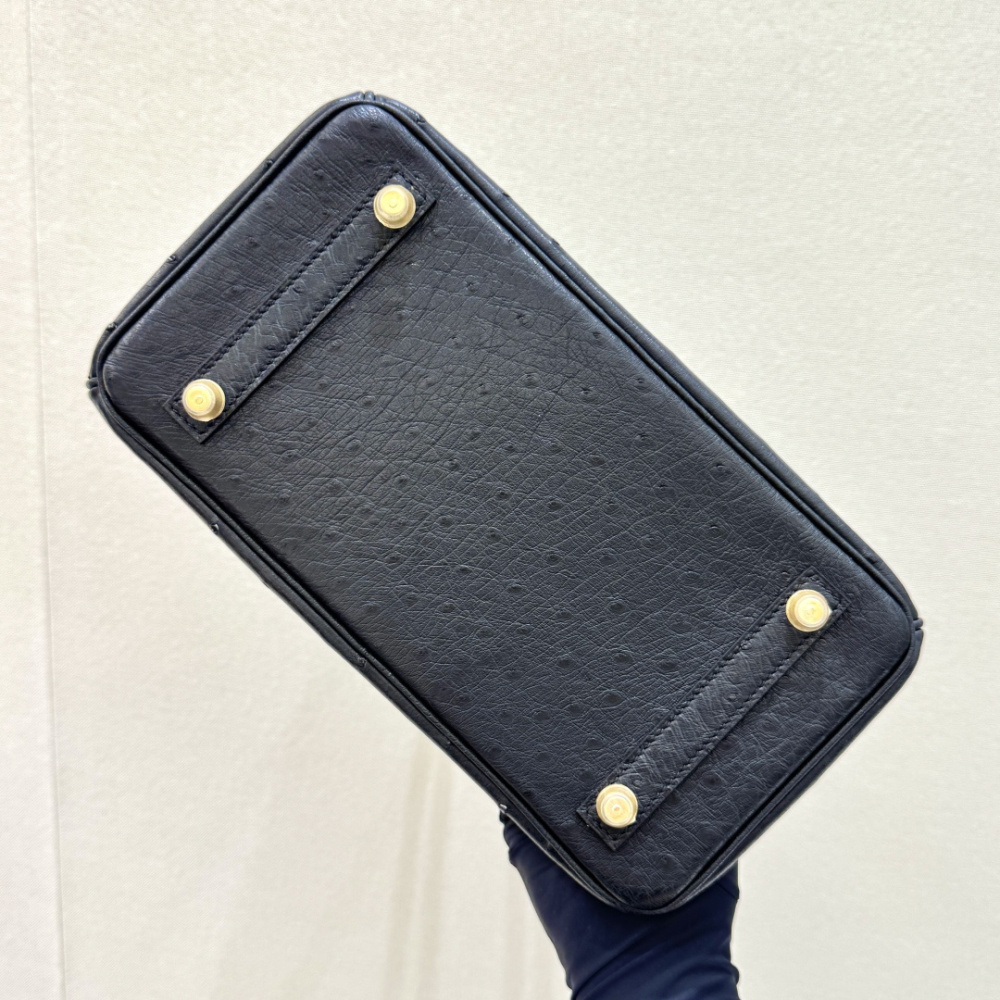 The Hermès Birkin 30 handbag in ostrich leather—featuring the classic black hue paired with gold hardware—is recognized by the brand as one of its "kings of value retention" among exotic skins.